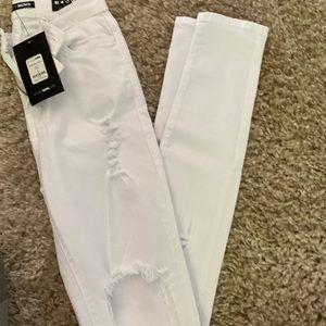 White ripped skinny stretch jeans